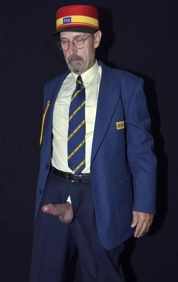 Dutch train official with open fly