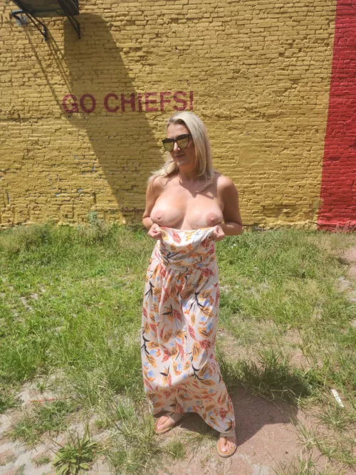 Flashing in downtown Kansas City. Sexy blonde hotwife with pierced 34Gs