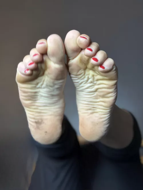 My feet are dirty and they smell incredible. I bet you'd love to sniff them and lick them clean.