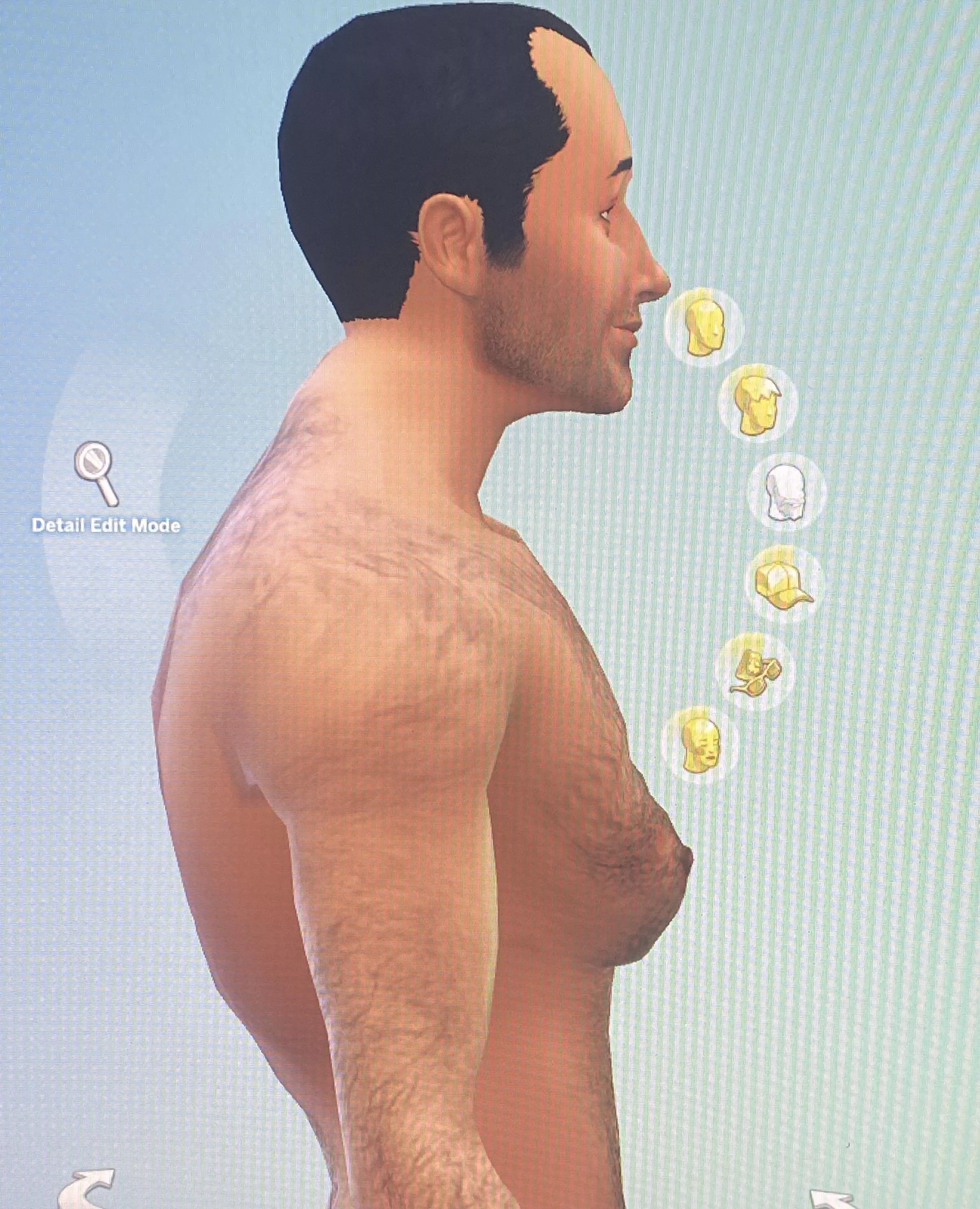 Why my sim have breasts how to remove it though??