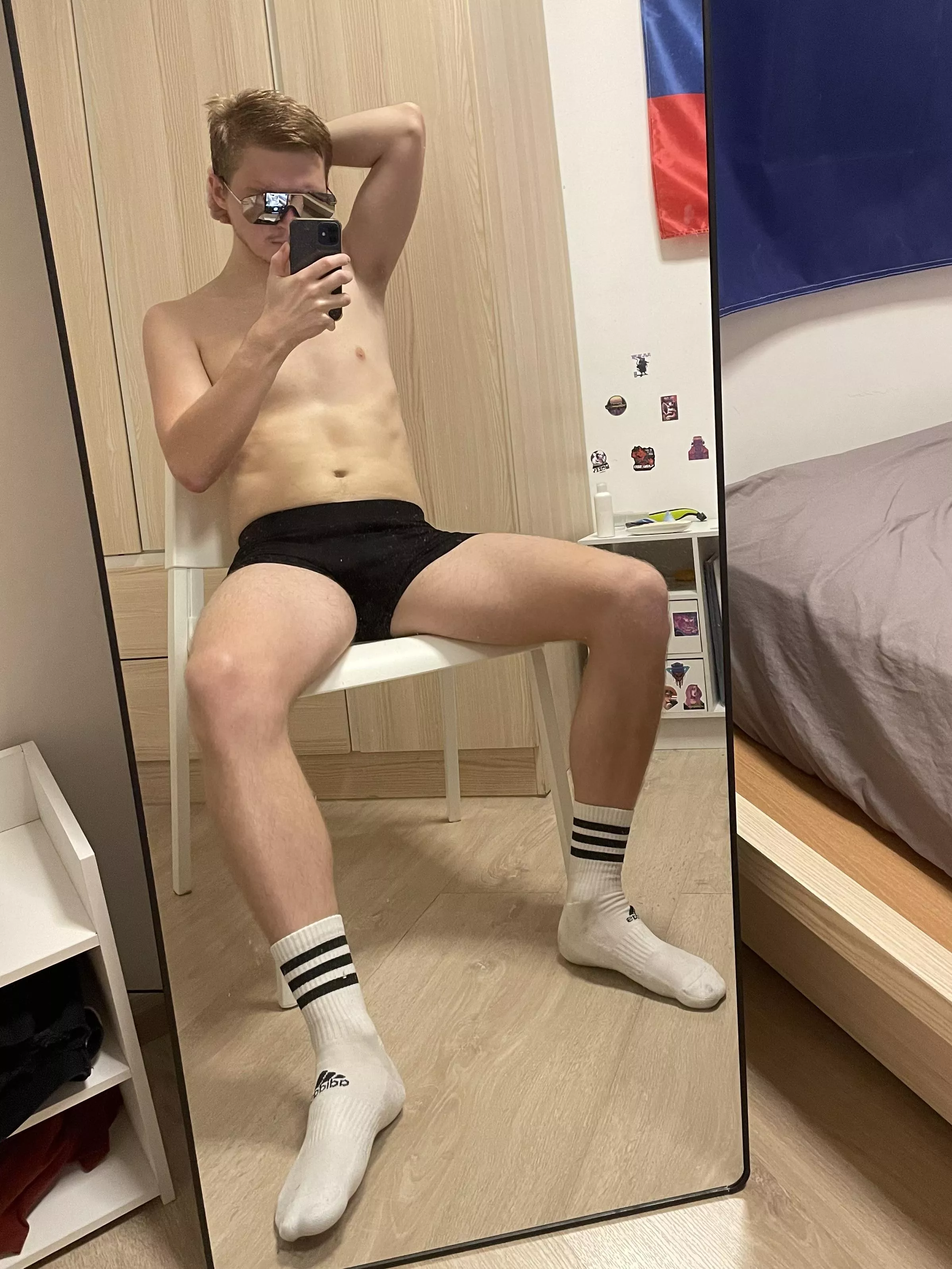 Socks on, shirt off, and serving up that post-workout glow 💪🏻🧦