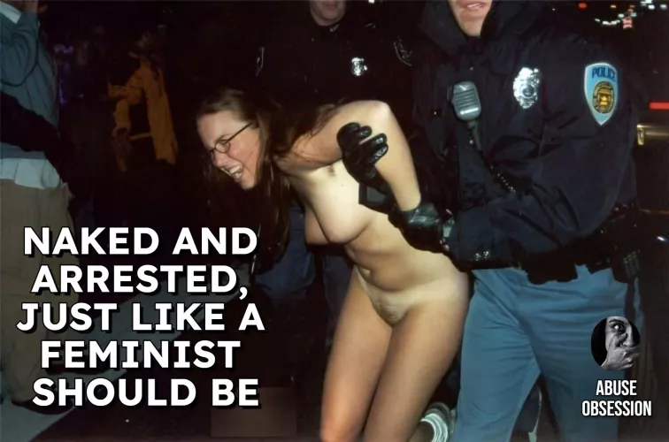 This feminist bitch was leading the feminist march.What should be her punishment?