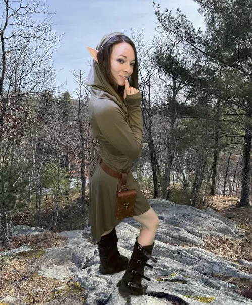 Would you follow this little elf through the forest to the waterfall?