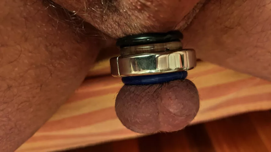 I tired progressing with some additional rings today and I immediately felt my testicles cords being stretched a lot with this setup, I tried striking but the cords where so stretched that they caused discomfort if I move my penis , is this normal ?