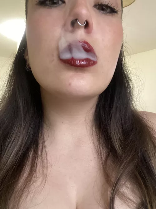 It's more than just smoking, babe... it's the way my lips tease, the way the smoke clings to me... you know it drives you wild. 