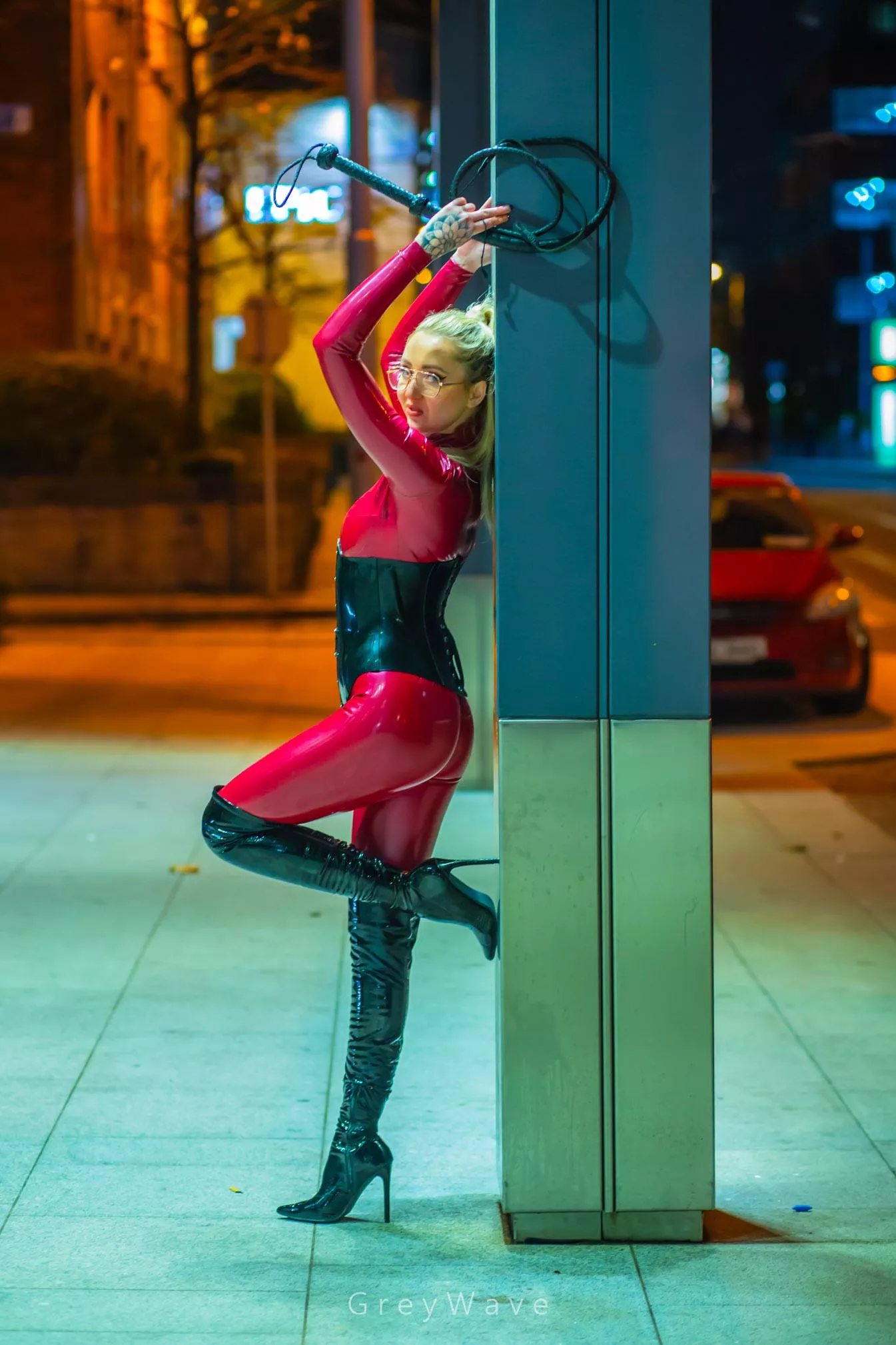 Bet you wish you were the post I'm resting my shiny thigh high boot on