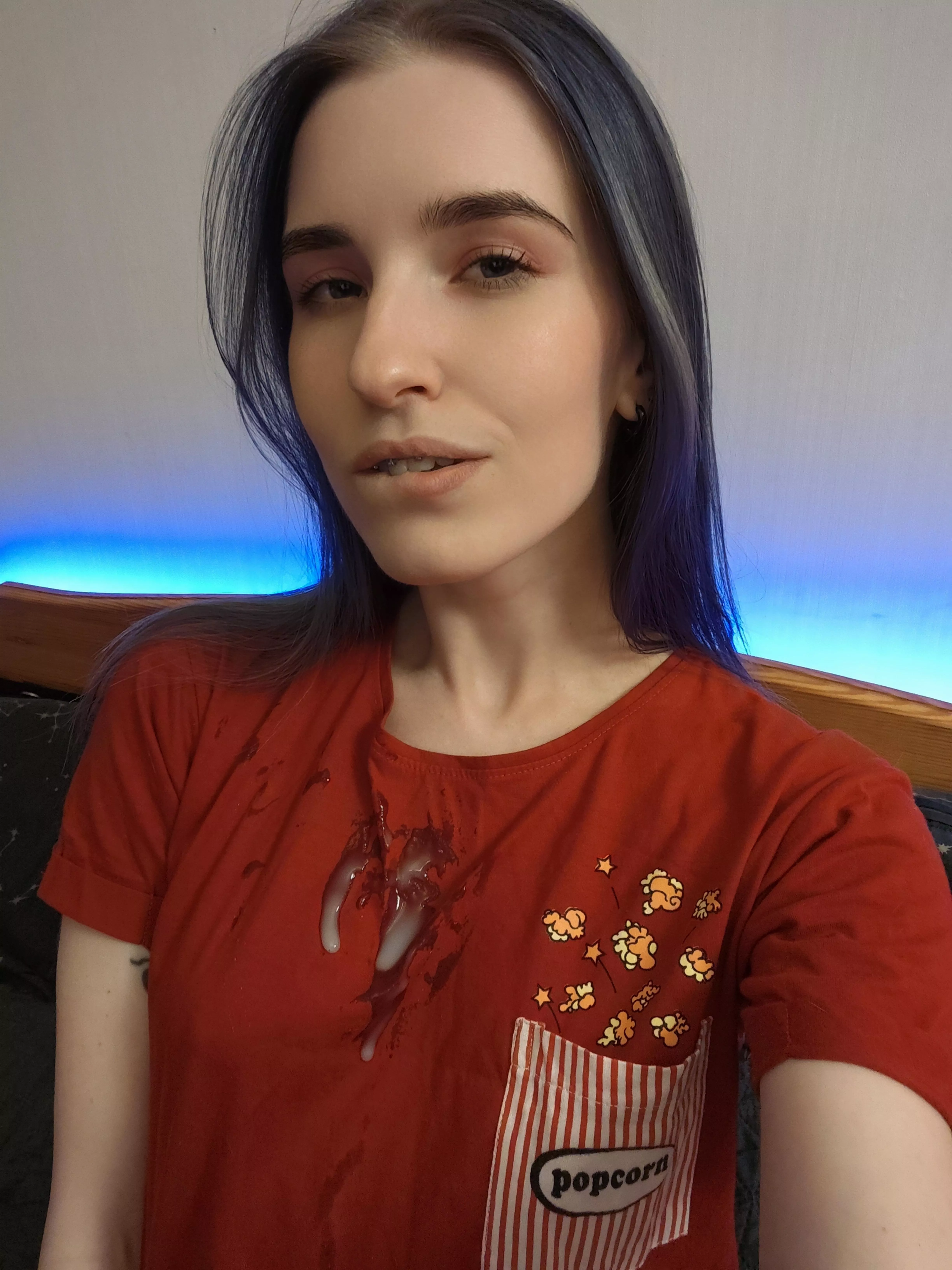 You stained my favorite T-shirt with popcorn, but it tastes even better with cum