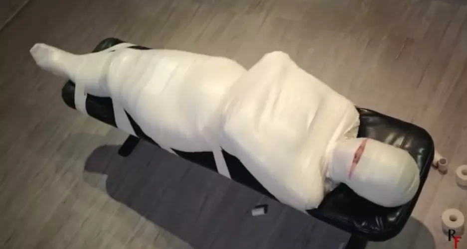 After sharing a fantasy of permanent mummification with my dom, they took it upon themselves to wrap me up like this, while I was asleep of course. Waking up like this was terrifying, even more so was how time drug on. I think that was years ago? They'r
