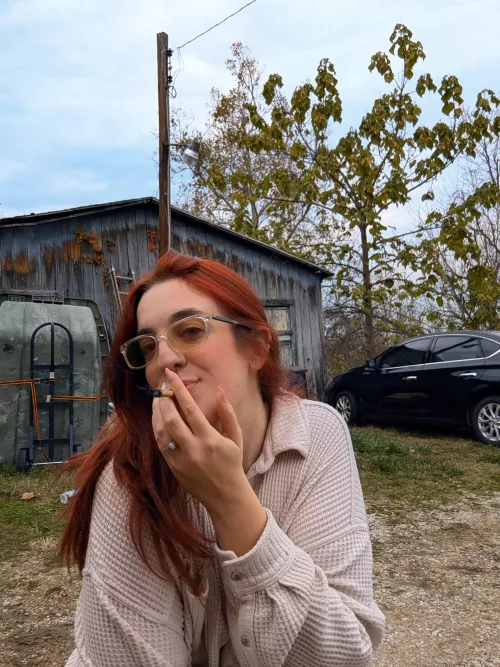 curvy girl smoking outside 