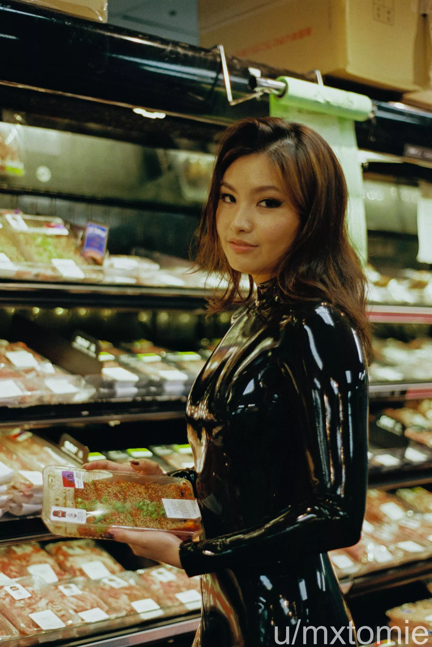 The meat section at the grocery story is extra tantalizing in shiny latex