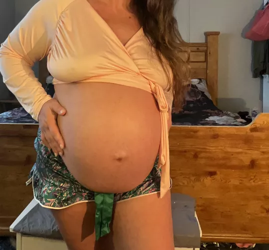 Are you rubbing my aching pussy over my shorts or sliding them off?