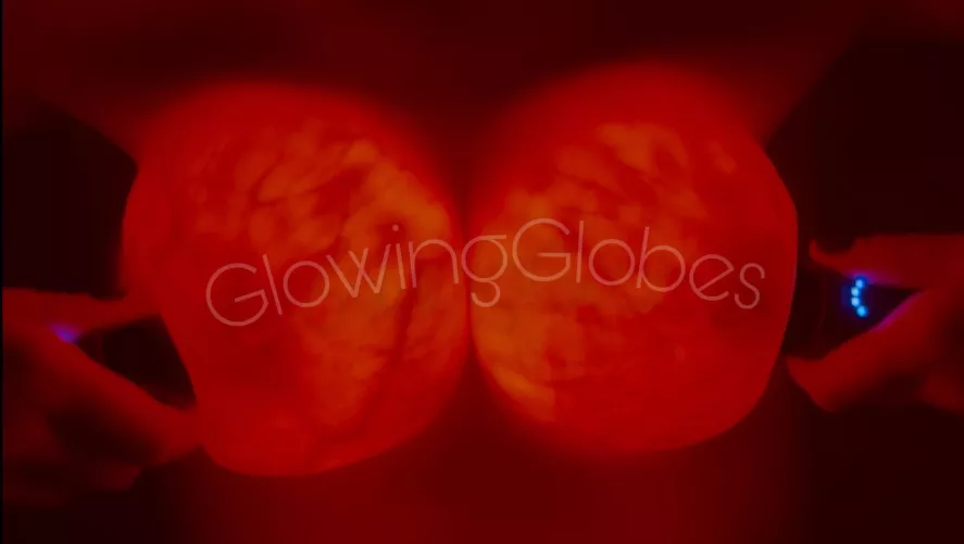 Glowing globes compressed together 