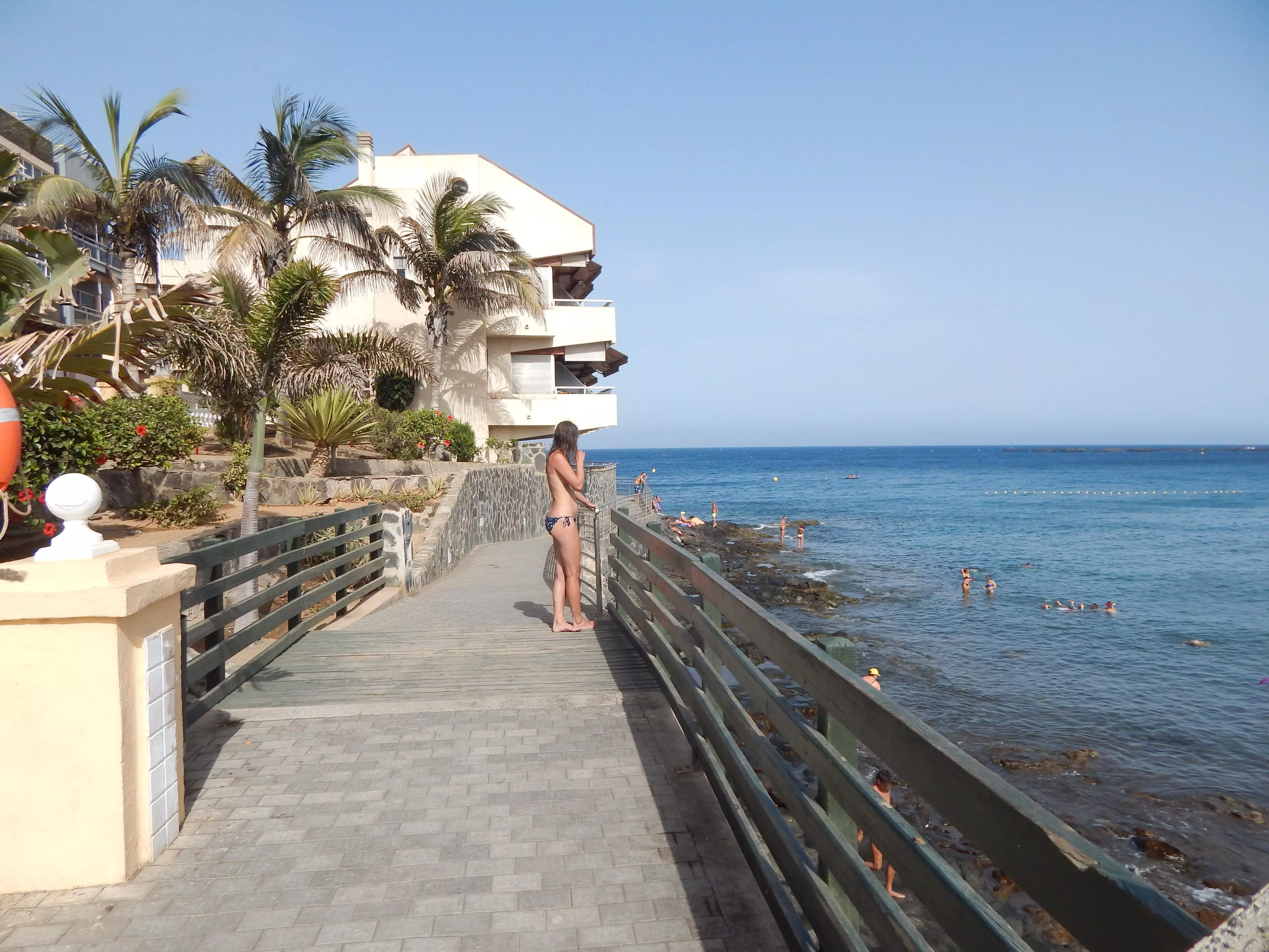 Topless on promenade