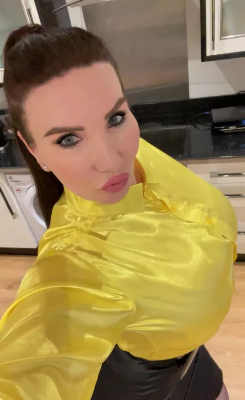 Do you like bright yellow satin blouses ? 