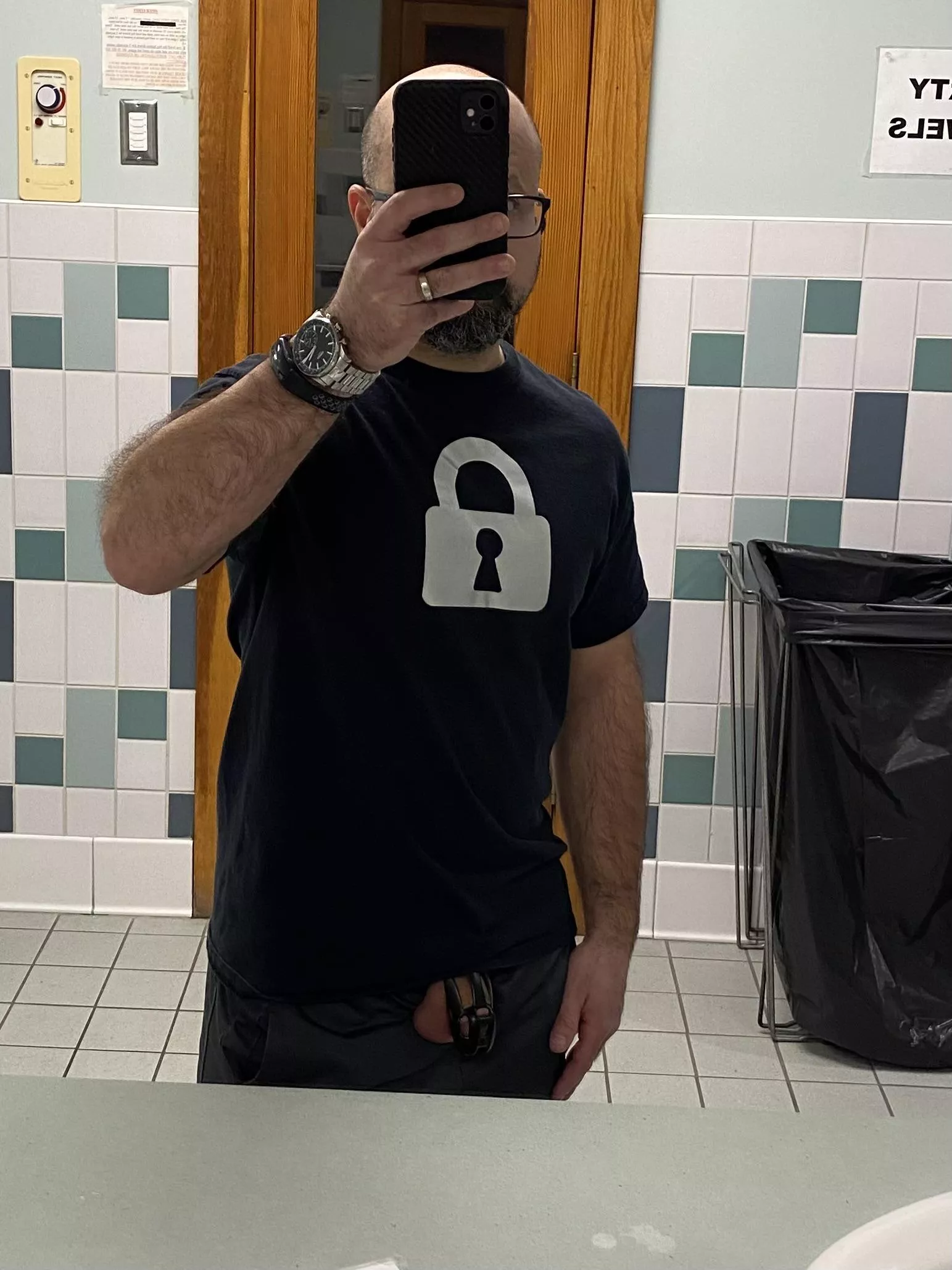 Gym locker room, T shirt says it all. 