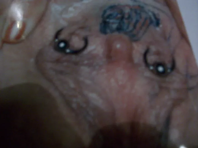 under her hood tattoo