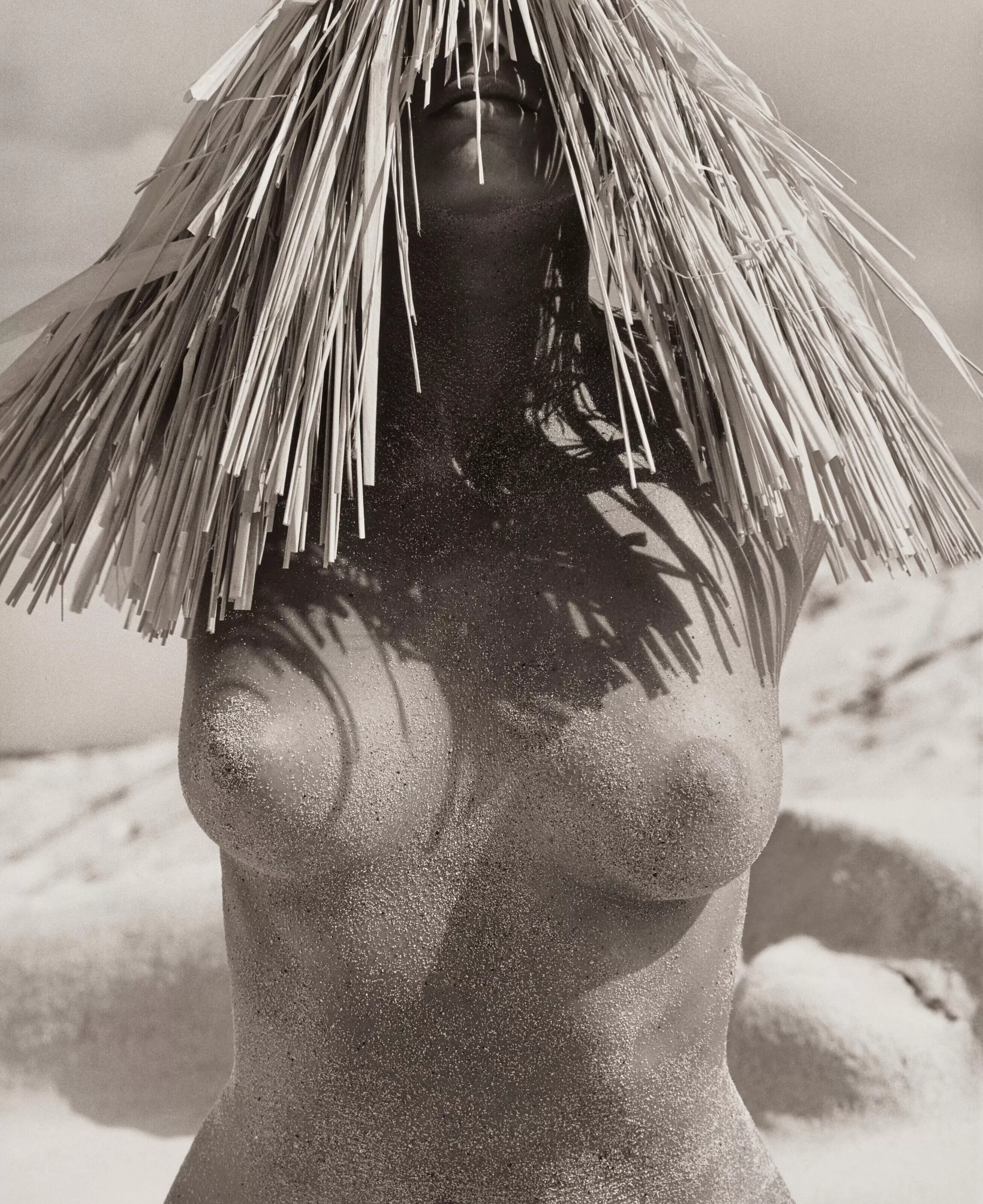 Cindy Crawford by Herb Ritts - Women with straw hat. 1988