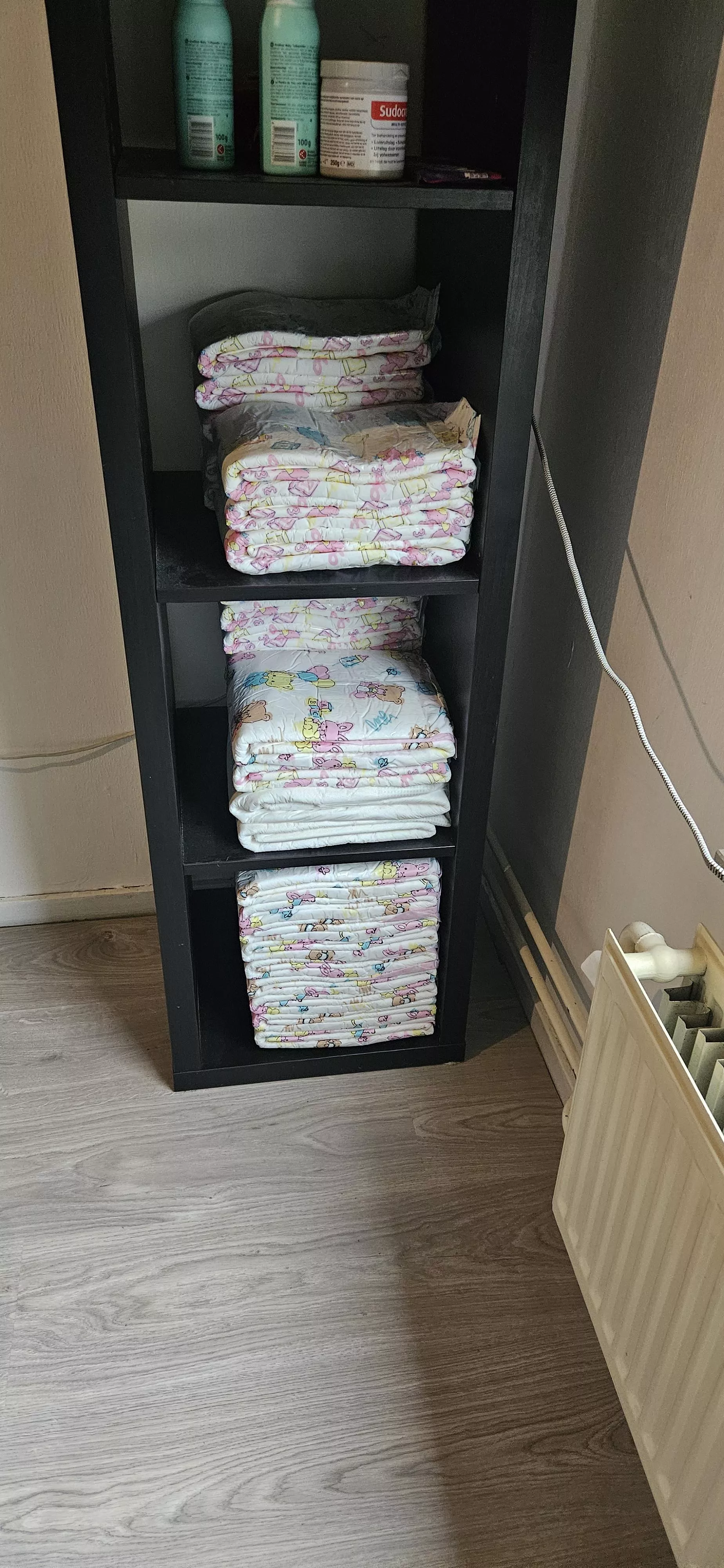 Yesterday ordered new diapers today new diapers arrived, diaper boy immediately refilled diaper cupboard. diaper boy making a mess in diaper again