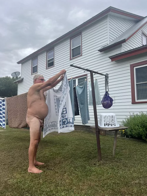 Grandpa hanging laundry