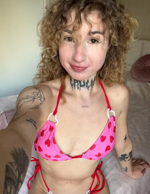 I love that cute swimsuit with the hearts on it