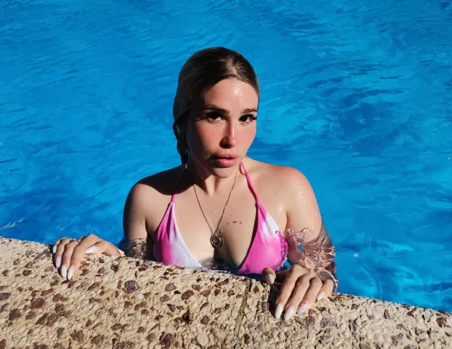 Pool time for this girl in a swimsuit