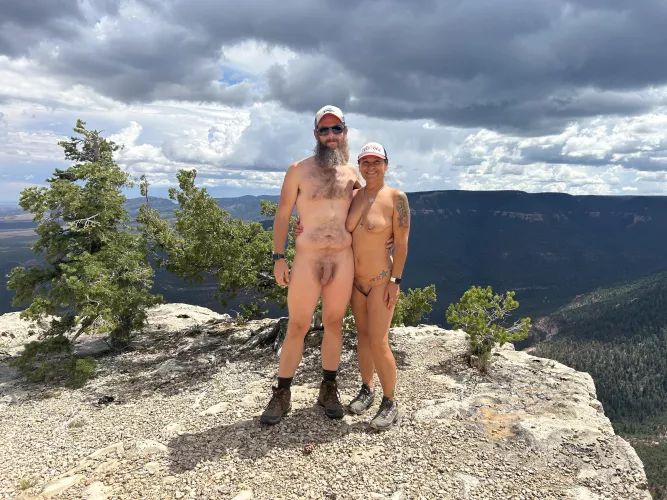 Young nudist couple enjoying the sun. 