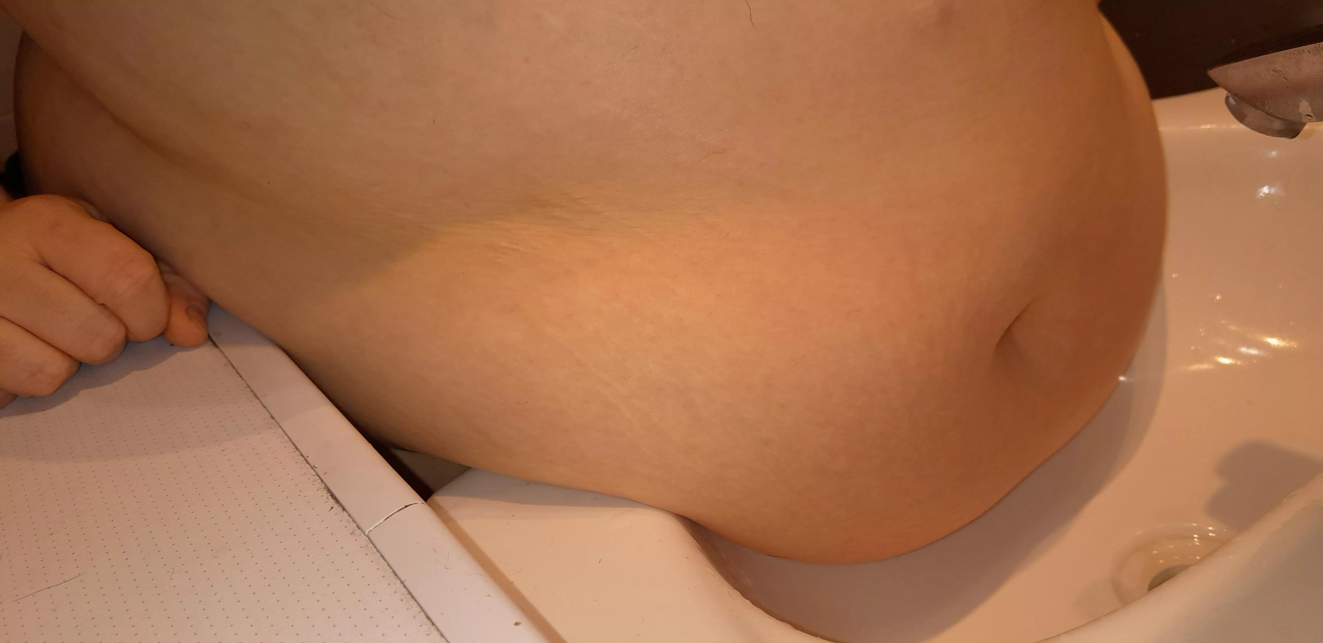 Filling sink with my belly 