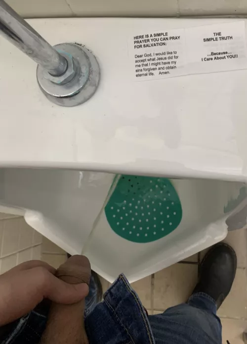 I had to take a pic of this card on the urinal