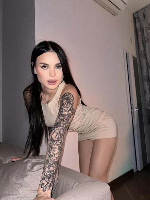 I love how this dress clings, and you?