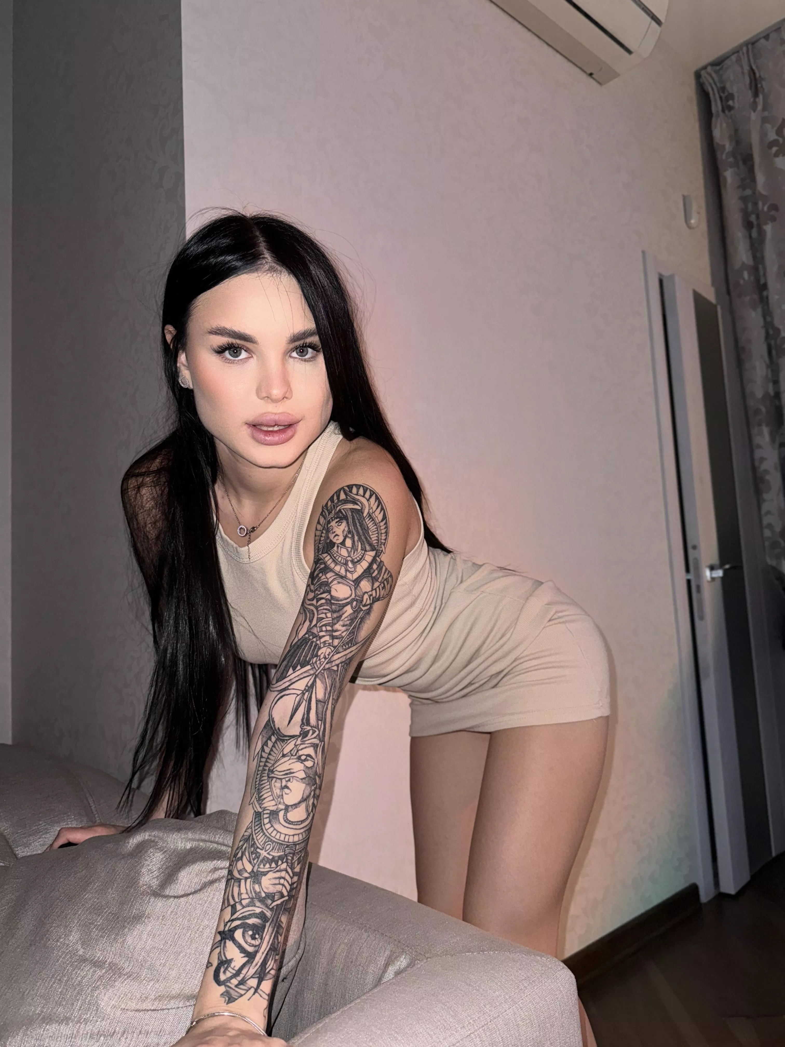 I love how this dress clings, and you?