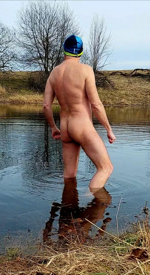 Late fall swim in a hidden mountain pond