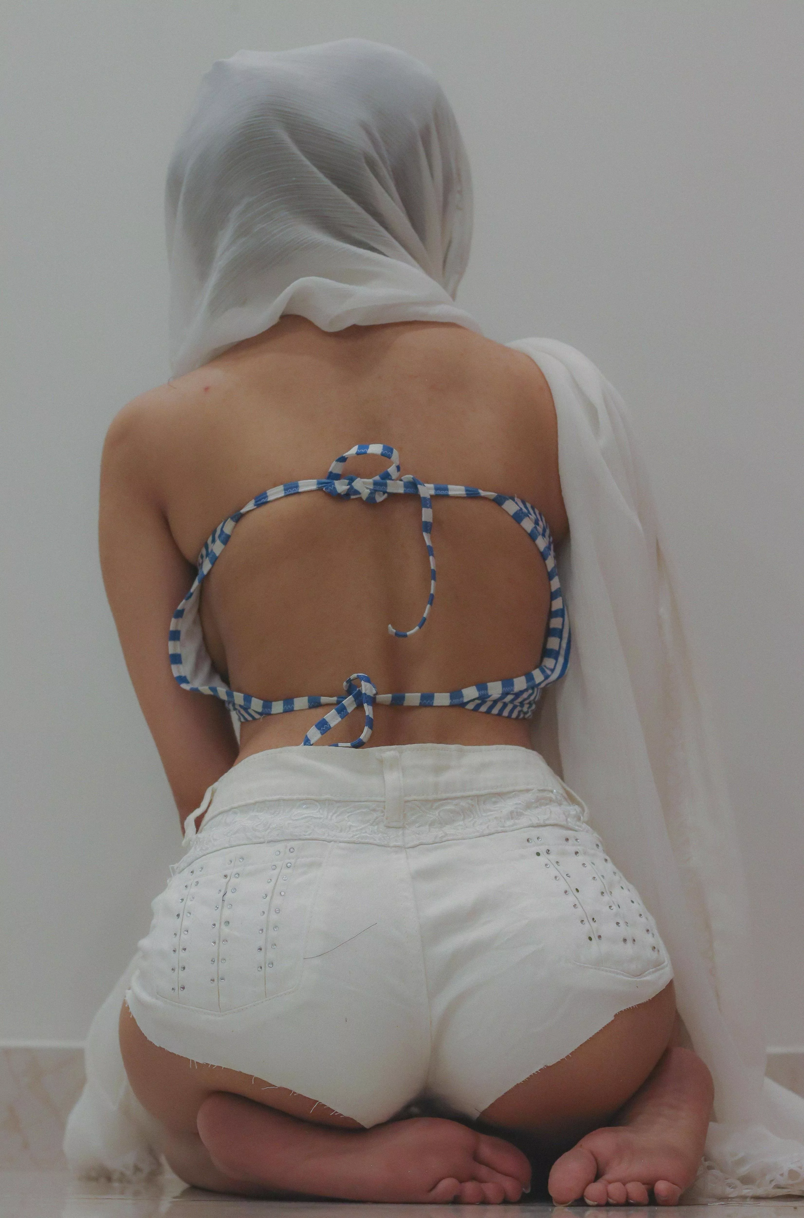 my ass is round and firm under my abaya