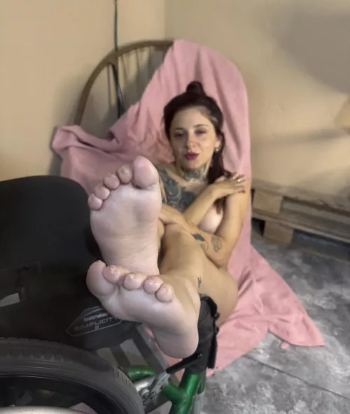 My feet came out of my wheelchair to rest for a while. 