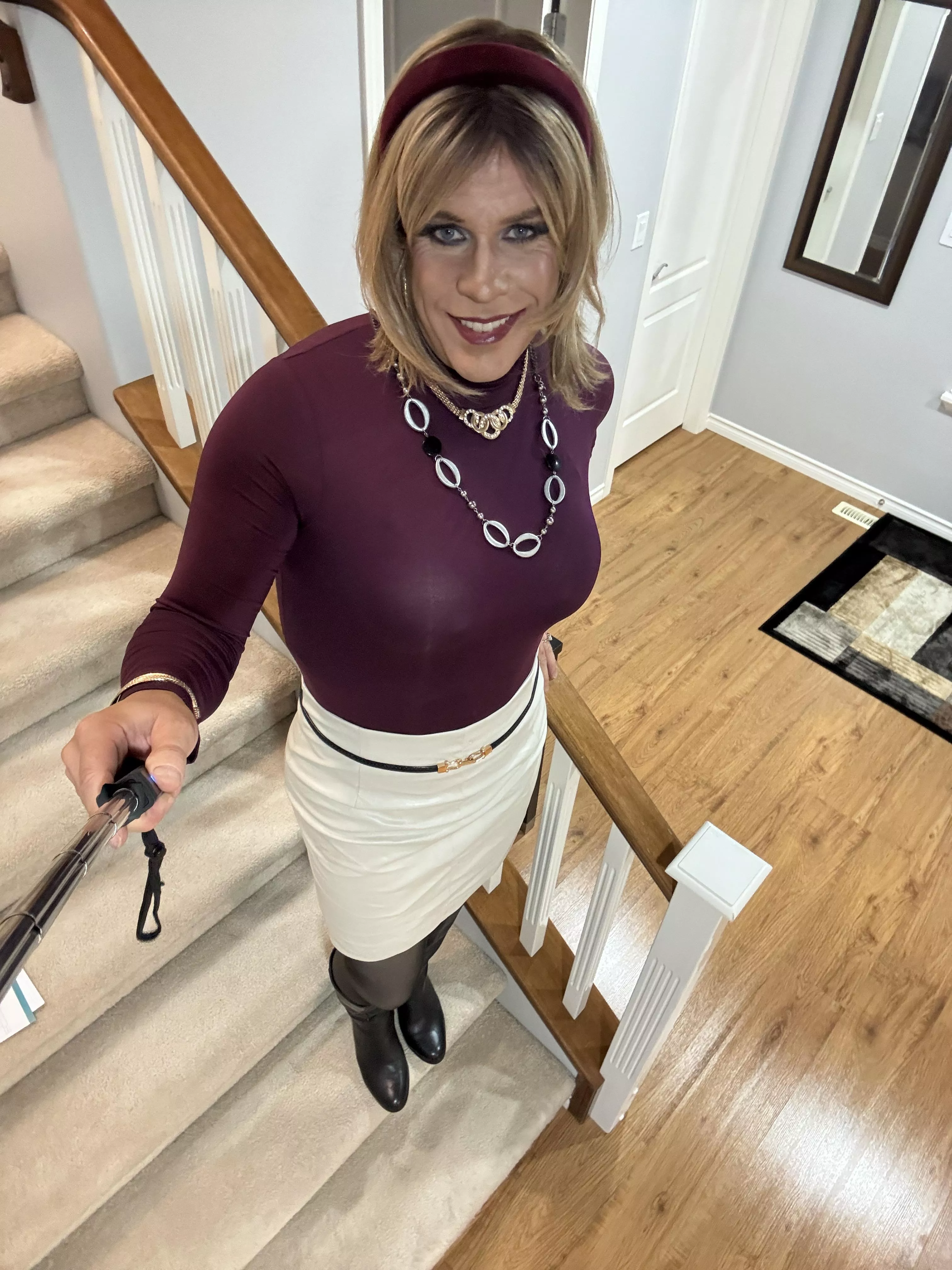 Who says you can’t look professional and classy in a leather skirt and boots?