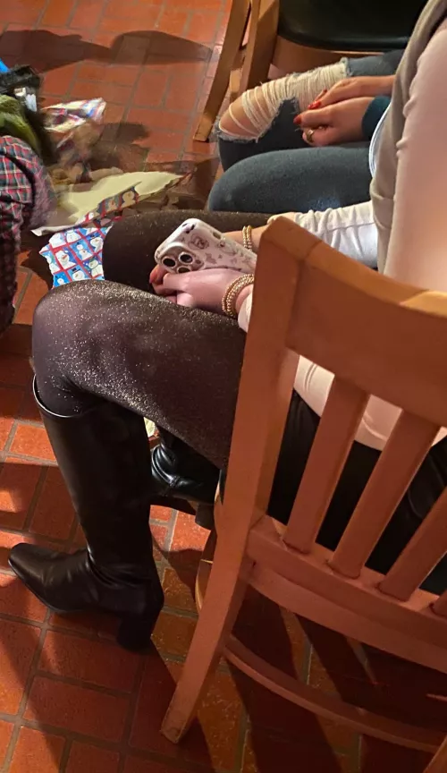 Shimmery hose and boots at holiday party