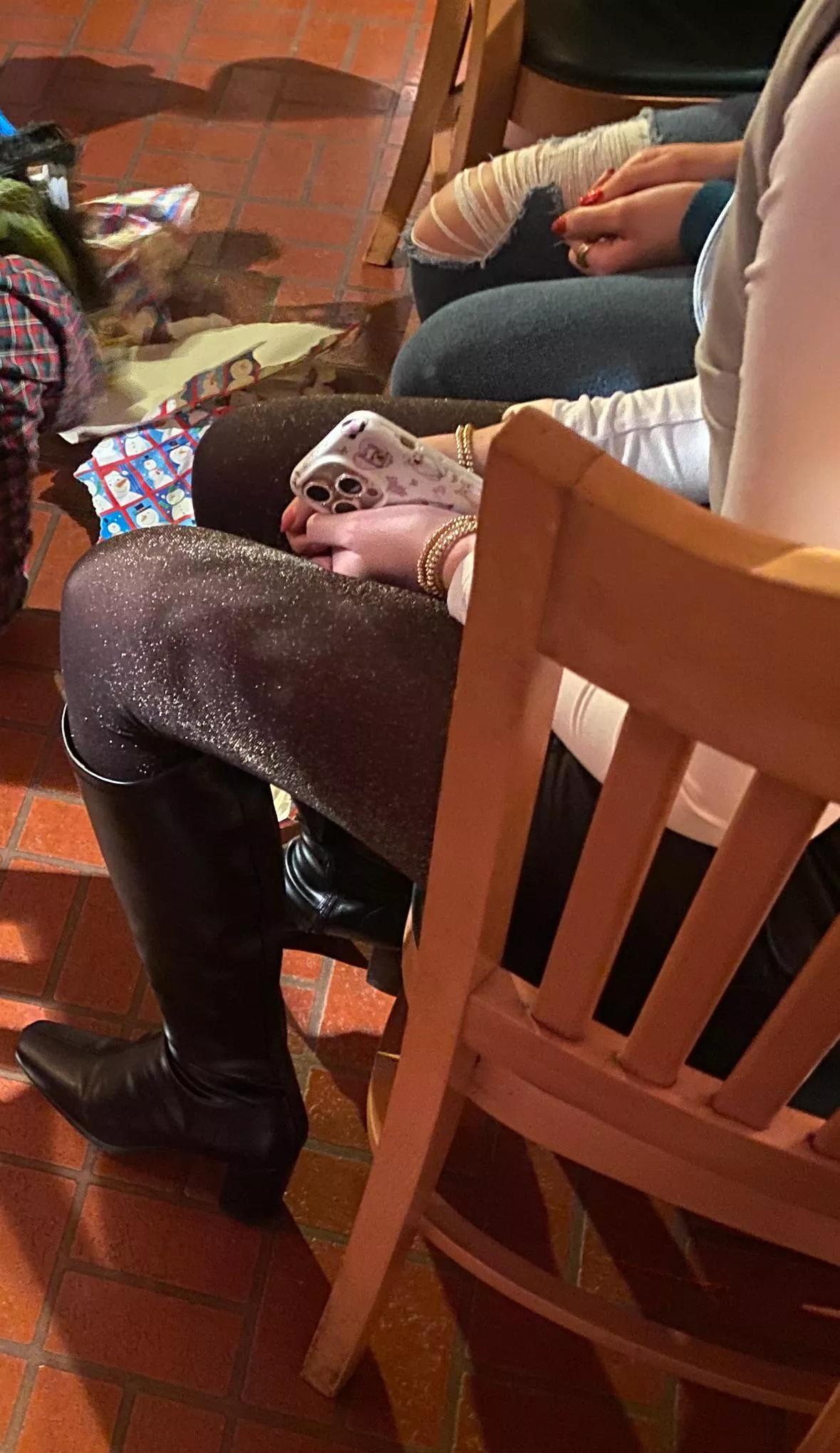 Shimmery hose and boots at holiday party