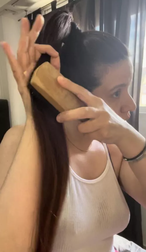 Brushing my ponytail