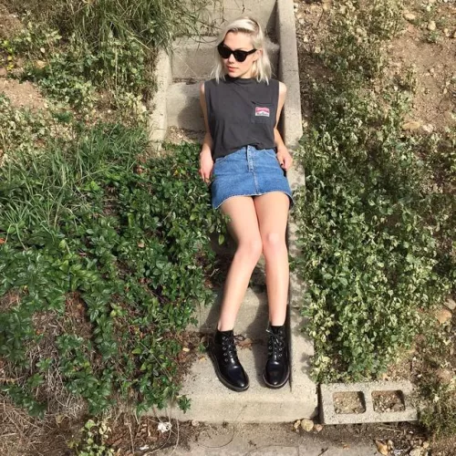 Leggy Phoebe lying on stairs