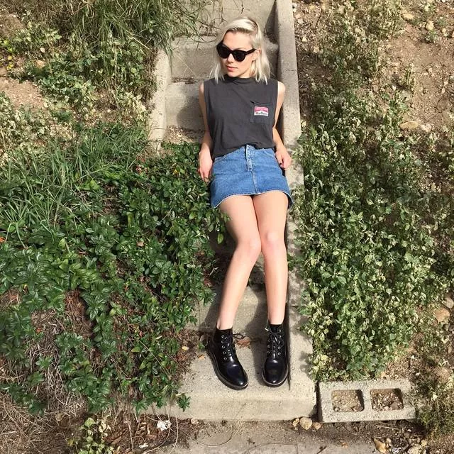 Leggy Phoebe lying on stairs