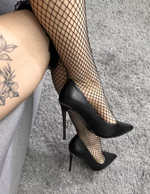 The best combination is black stockings and heels