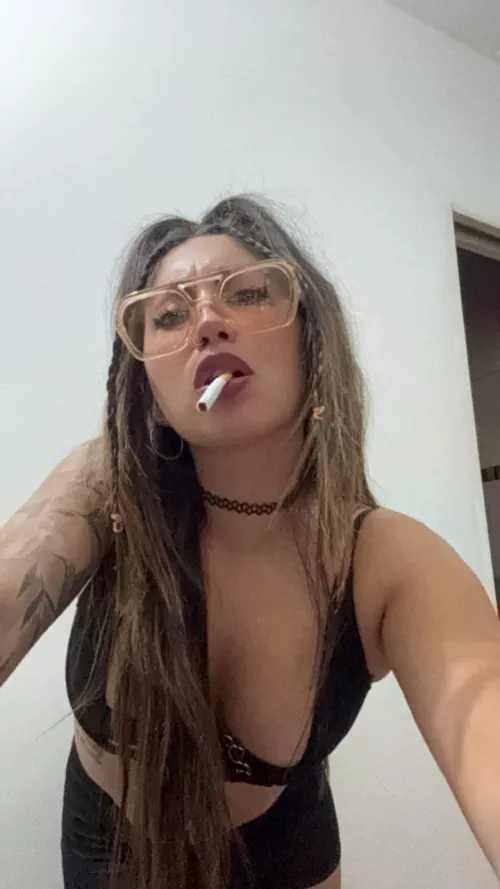 What do you think about when you smoke?This milf thinks about how life goes by