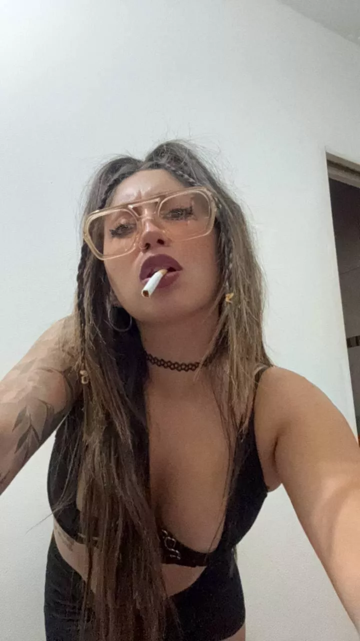 What do you think about when you smoke?This milf thinks about how life goes by