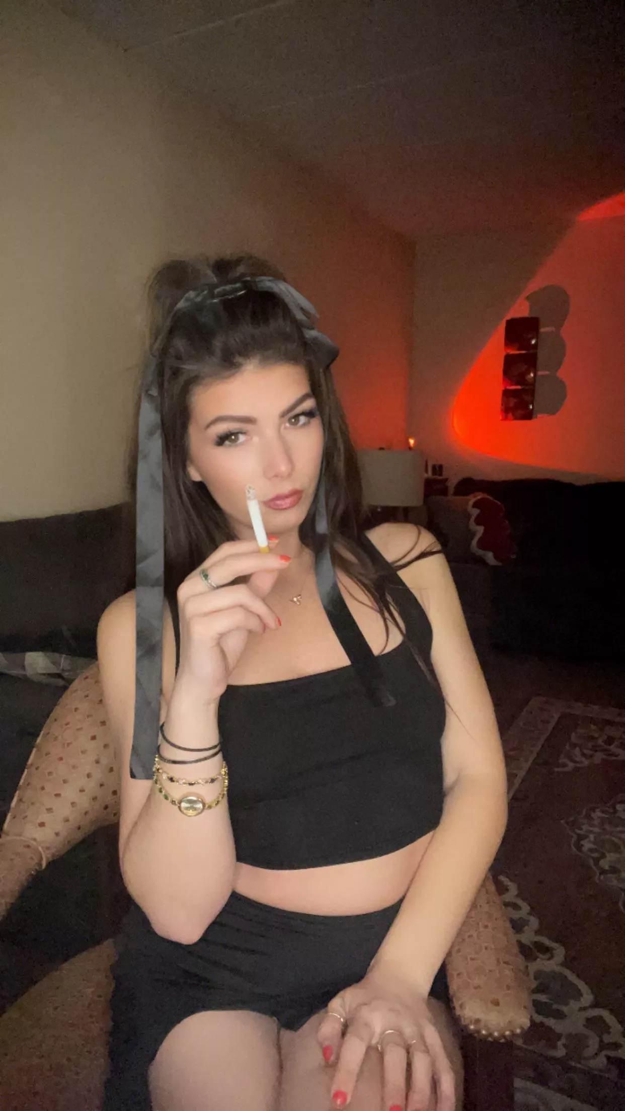 You wish you were this cigarette- held, used, and then forgotten.