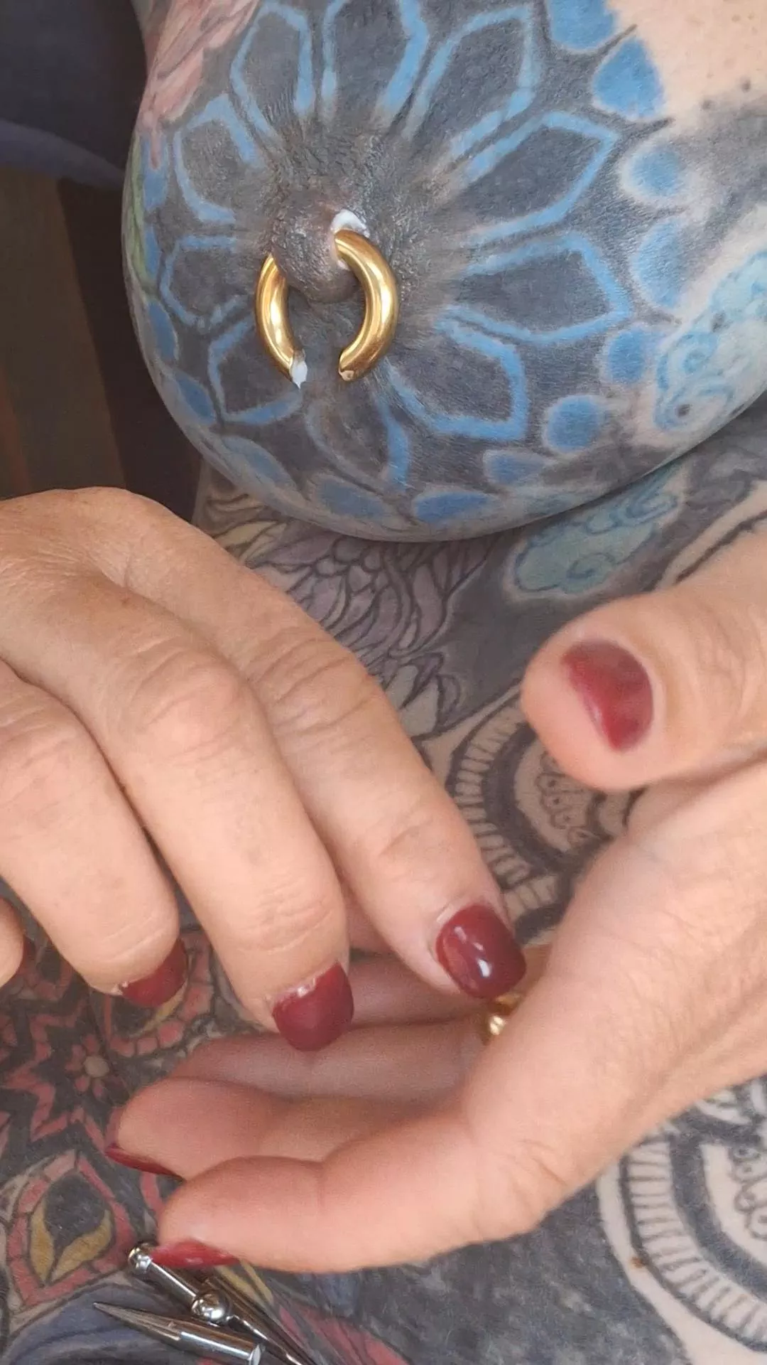 2g (6mm) nipple piercings. When should I stop stretching?