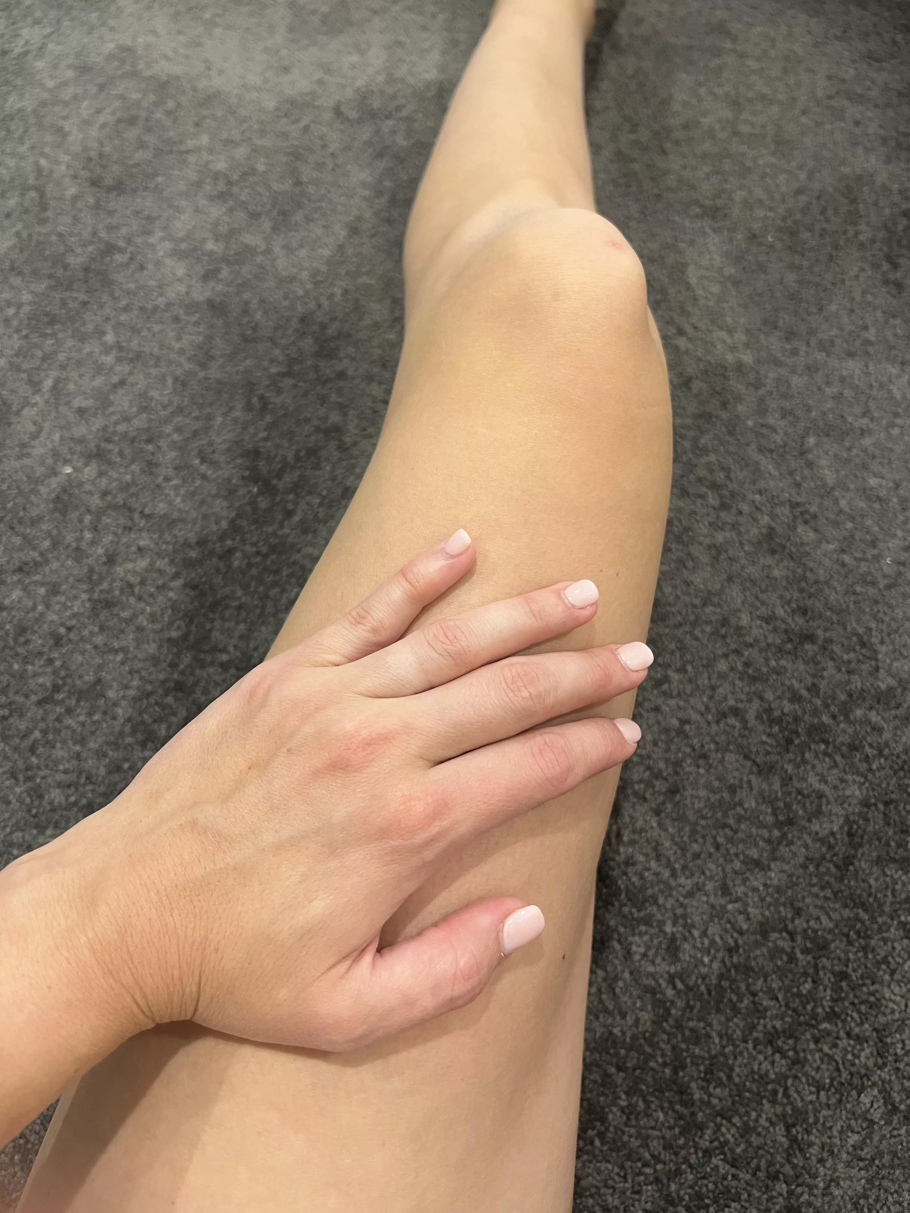 My hands on silky smooth thigh