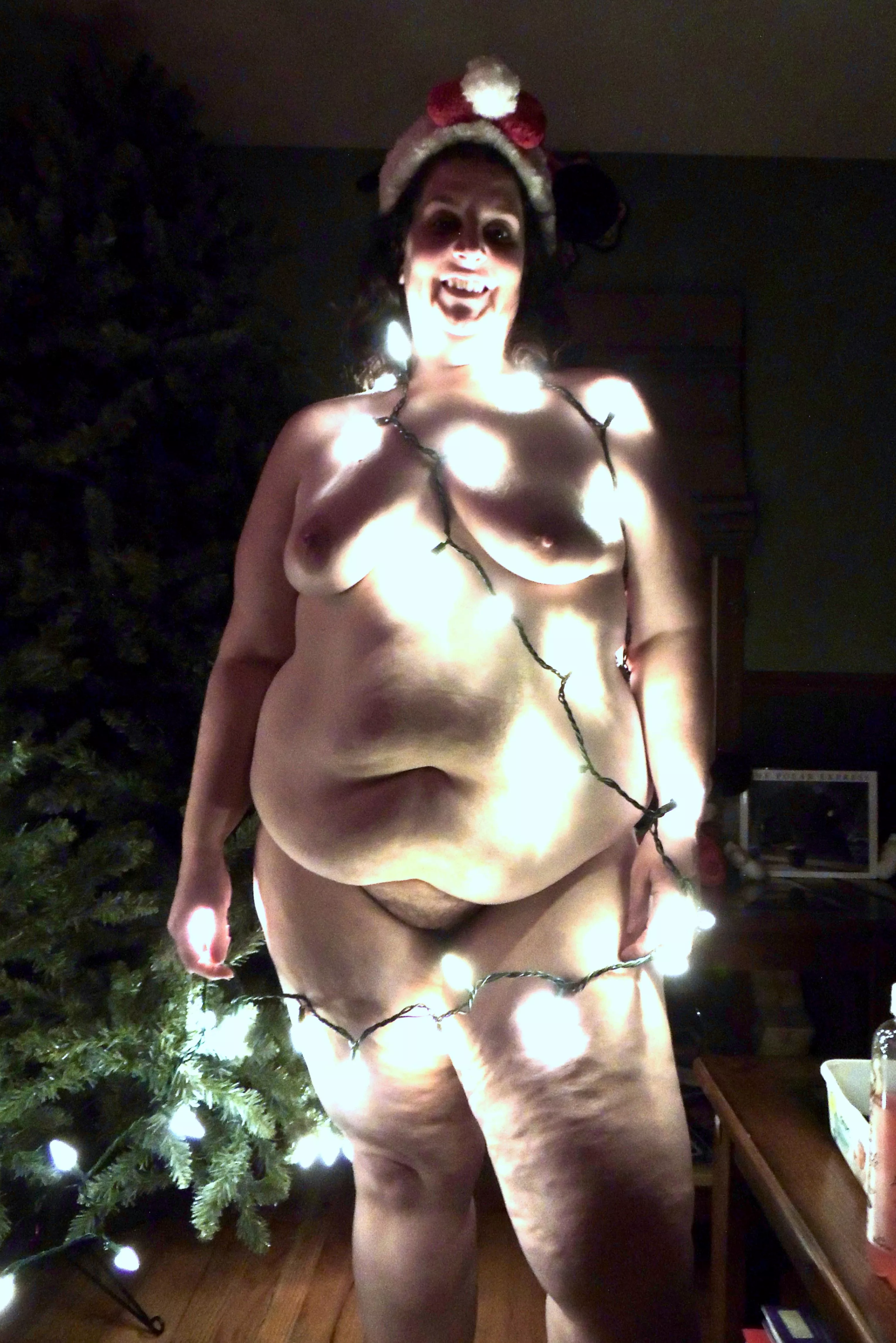Putting the lights on the Christmas tree