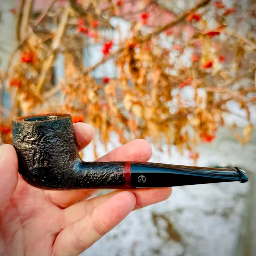 A pipe of tobacco on a winter's day.