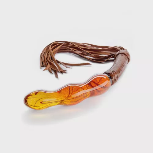 Even though Goddess Sunshine rescinded my Christmas bonus for suspect reasons, I felt bad about a nightmare I had last night. That's why I dipped into my savings and bought her a Fornicouture Fuji Glass Dildo Whip. I laid in on her desk with a card sign