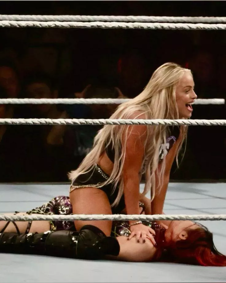 Liv Morgan straddles IYO SKY 