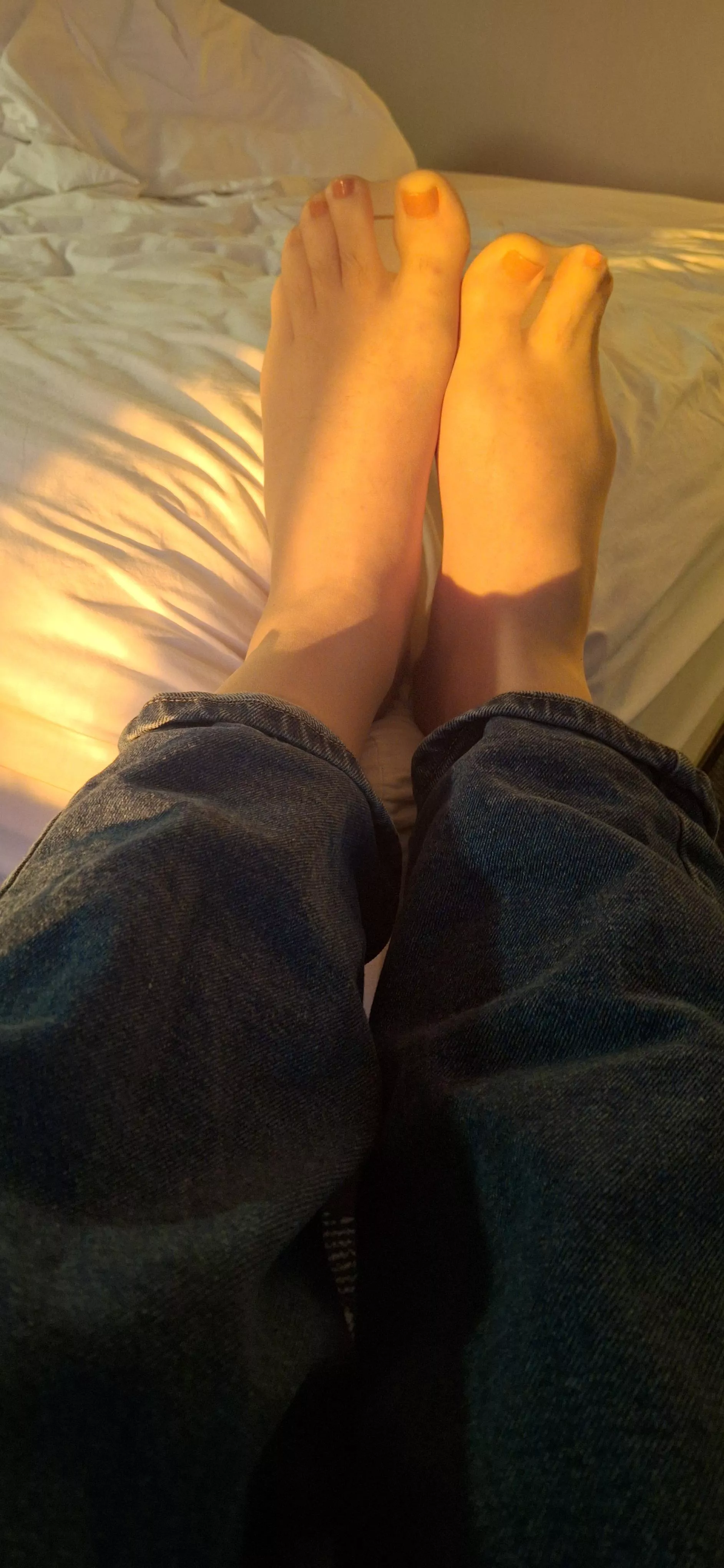 Pink toe nails, tan pantyhose.